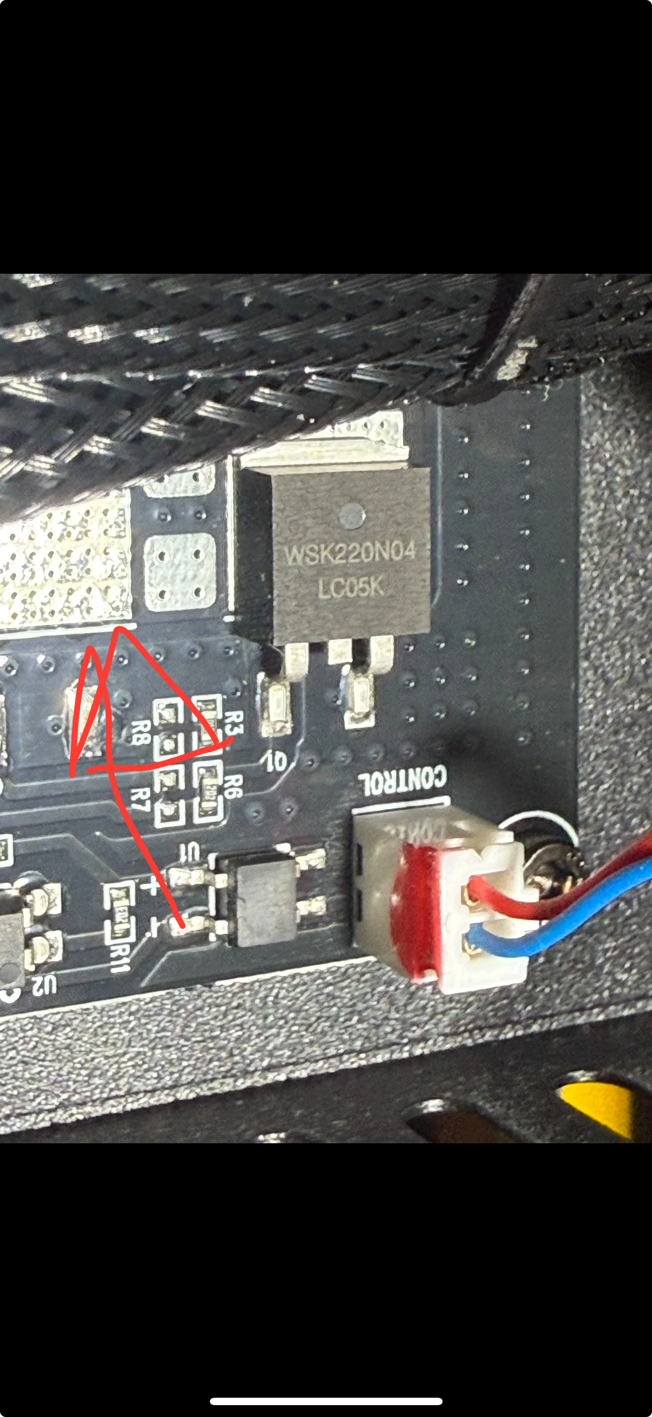 Board area near R8 with red pen marking possible charring