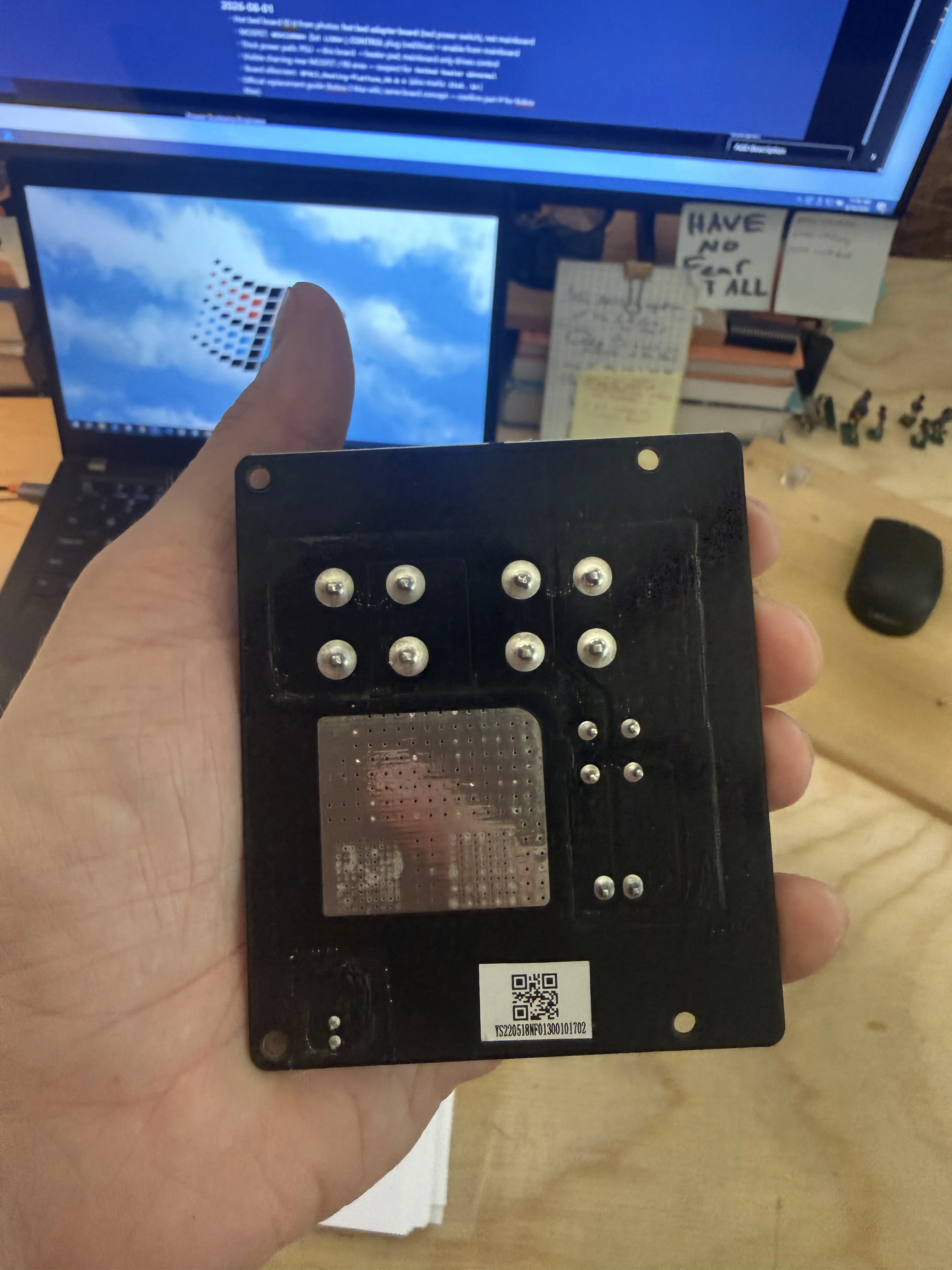 Backside of the hotbed adapter board with solder joints and QR label