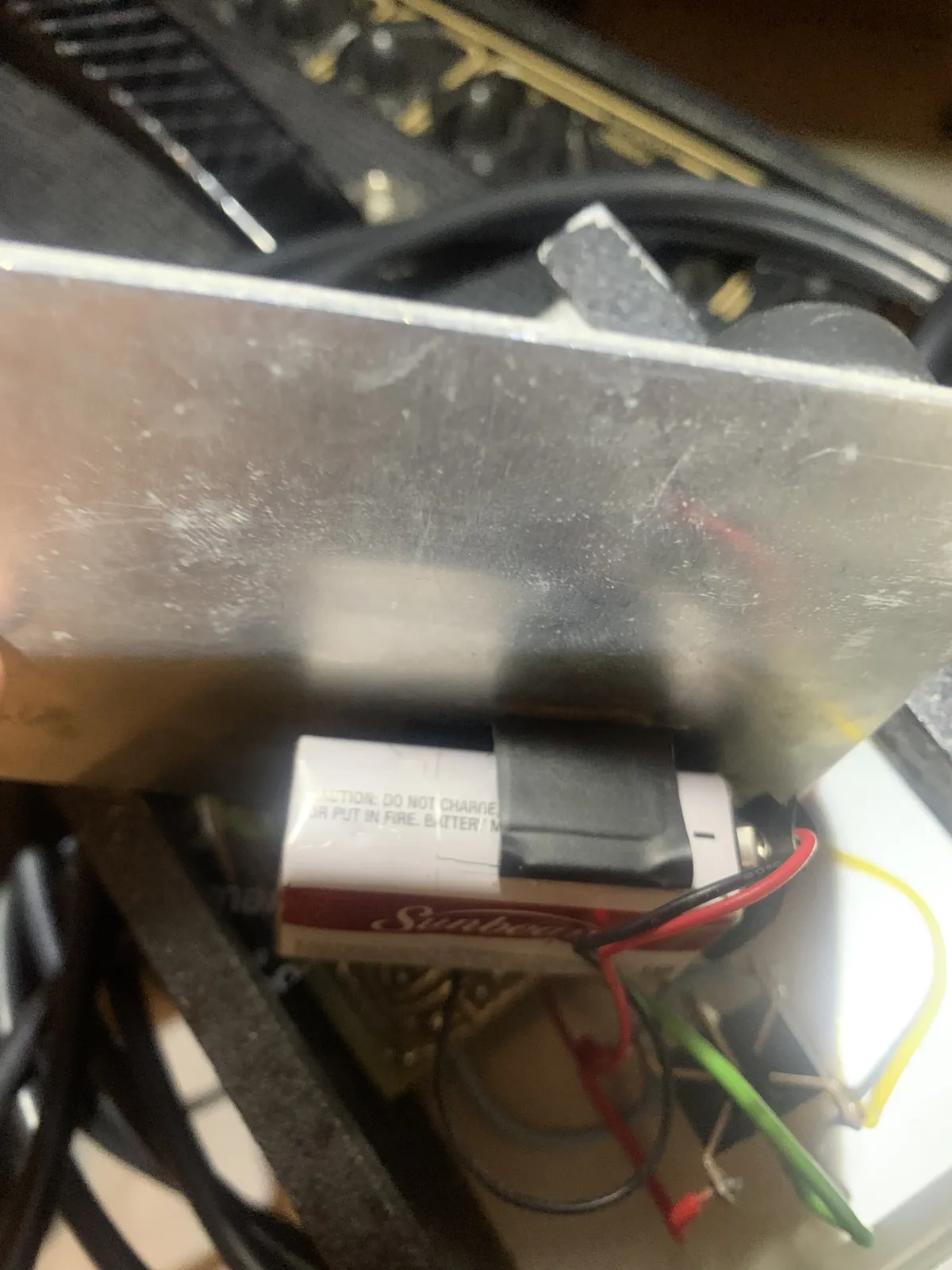 Battery repositioned under the panel