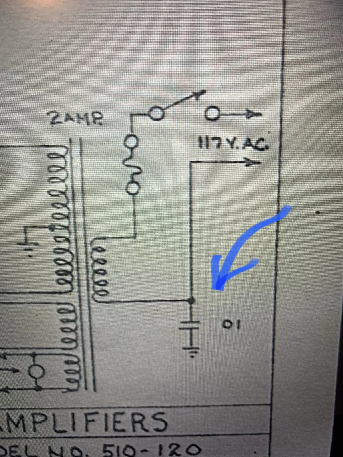Close-up of the manual schematic power section with an arrow at the .01 capacitor to chassis